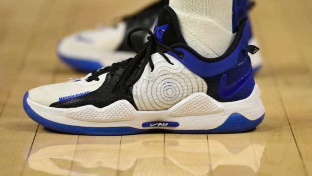 Paul George wearing the Nike PG 5 'Playstation Racer Blue'.